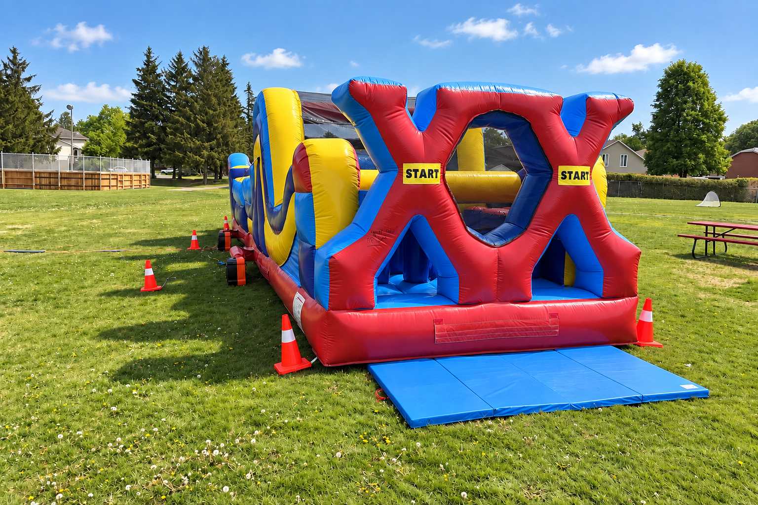 Red X entrance with two lanes and a blue entrance mat on the 46ft Extreme X course